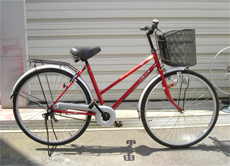 シティサイクル車に荷台、両立スタンドを取り付け